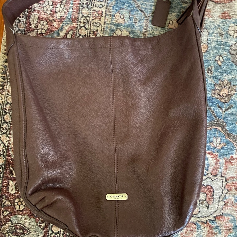 Coach bag, burgundy/brown color good used condition with plenty of life left!